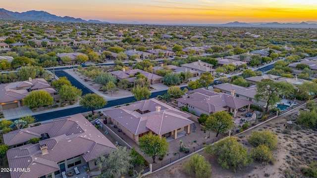 aerial view at dusk with a mountain view