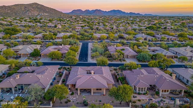 aerial view at dusk with a mountain view