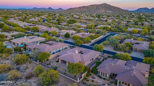 aerial view at dusk with a mountain view