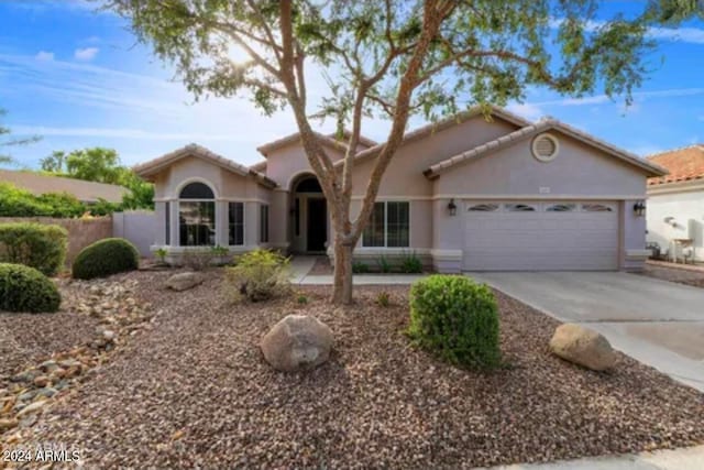 view of front of home with a garage