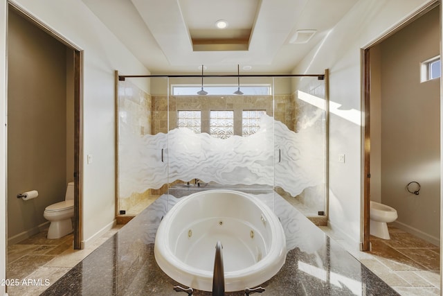 bathroom with separate shower and tub, toilet, and a tray ceiling