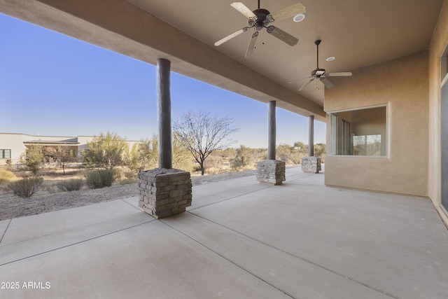 view of patio with ceiling fan