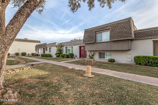 view of front of home with a front yard