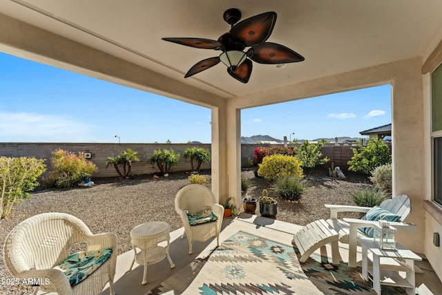 20701 W Minnezona Ave, Buckeye, AZ 85396 - view of patio / terrace with a ceiling fan and a fenced backyard