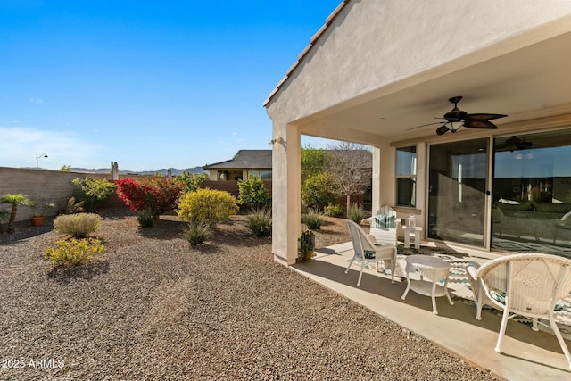 20701 W Minnezona Ave, Buckeye, AZ 85396 - view of yard with a patio, a ceiling fan, and fence