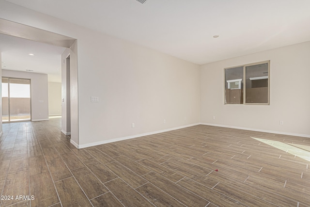 unfurnished room featuring wood-type flooring