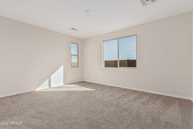 view of carpeted spare room