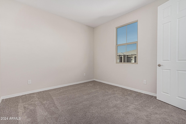 unfurnished room featuring carpet floors