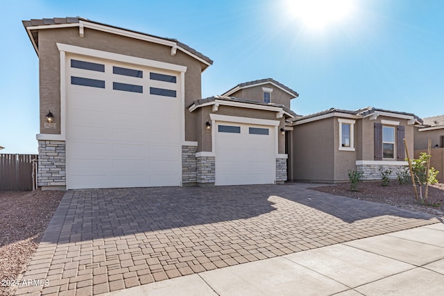 view of front of property with a garage