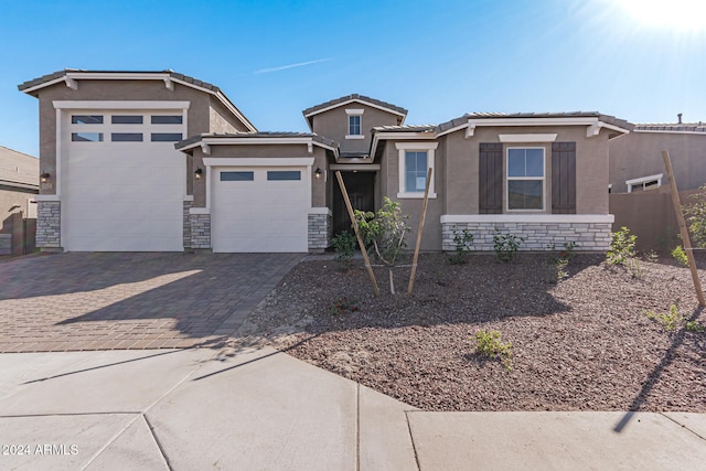 view of front of home with a garage