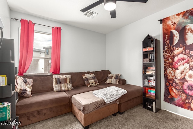 carpeted living room featuring visible vents and ceiling fan