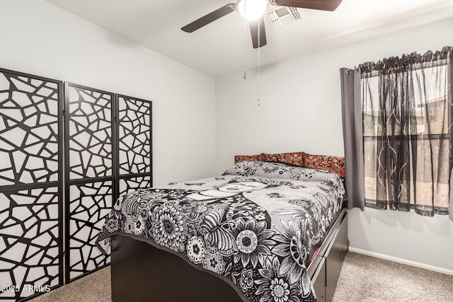 bedroom featuring visible vents, a ceiling fan, and carpet floors