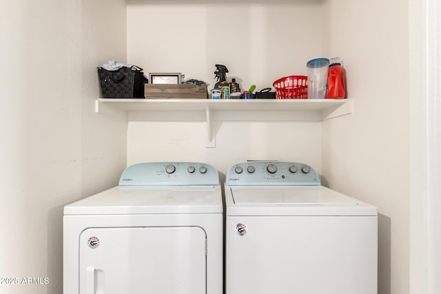 laundry room with separate washer and dryer