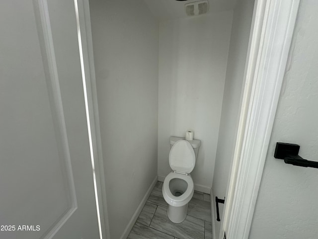 bathroom featuring toilet