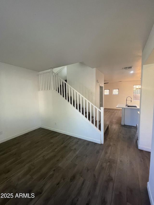 interior space with sink and dark hardwood / wood-style floors