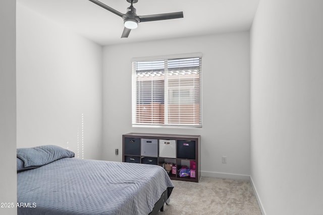 bedroom featuring carpet flooring, ceiling fan, and baseboards