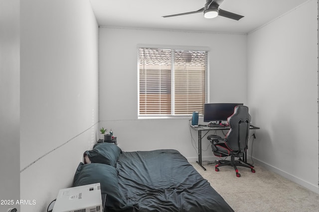 bedroom featuring carpet floors, baseboards, and a ceiling fan