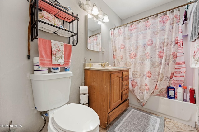 full bath featuring shower / bath combo, vanity, and toilet