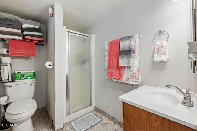 full bathroom with toilet, vanity, baseboards, and a stall shower