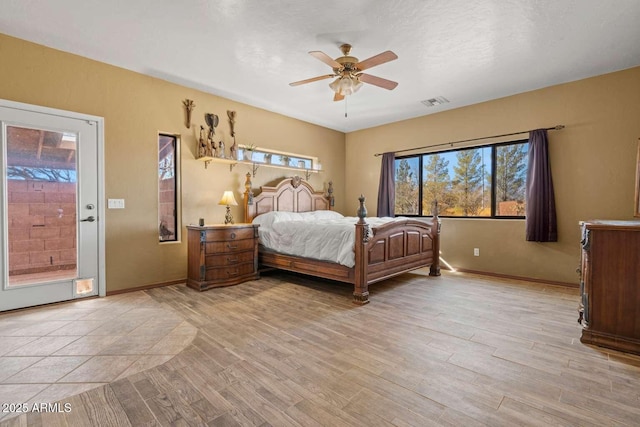 bedroom with visible vents, light wood-style floors, a ceiling fan, access to outside, and baseboards