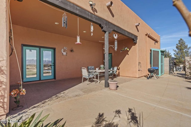 view of patio with outdoor dining space