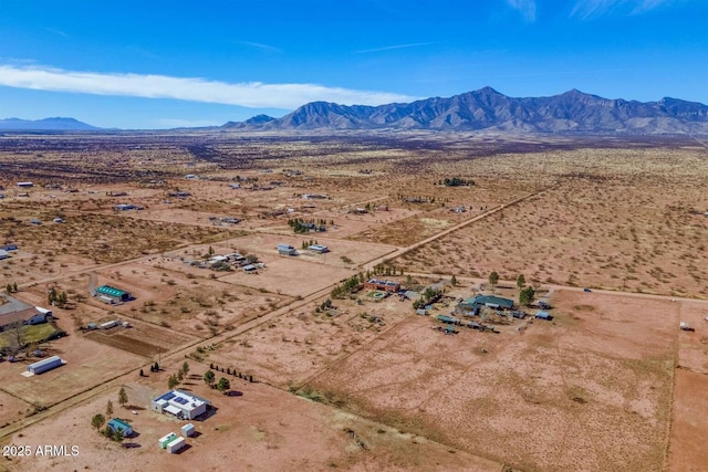 drone / aerial view with a desert view and a mountain view