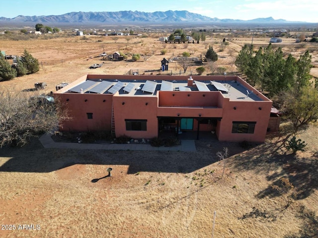 aerial view featuring a mountain view