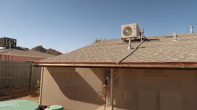 view of home's exterior featuring ac unit and cooling unit