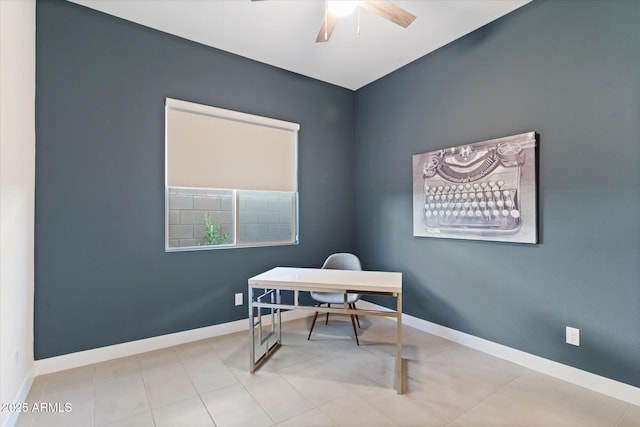 home office with ceiling fan and light tile patterned floors