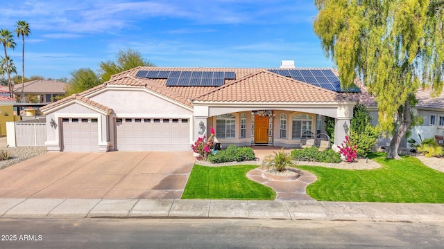 mediterranean / spanish-style house with a garage, a porch, a front yard, and a tile roof