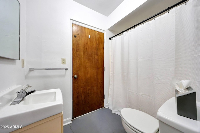 1106 N Villa Nueva Dr, Litchfield Park, AZ 85340 - full bathroom featuring toilet, finished concrete flooring, and vanity