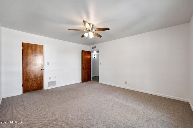 1106 N Villa Nueva Dr, Litchfield Park, AZ 85340 - empty room with carpet flooring, a ceiling fan, and baseboards