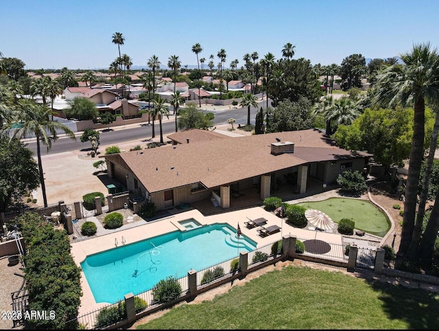 1106 N Villa Nueva Dr, Litchfield Park, AZ 85340 - view of pool with an area to practice putting, a patio, an in-ground hot tub, and a gate