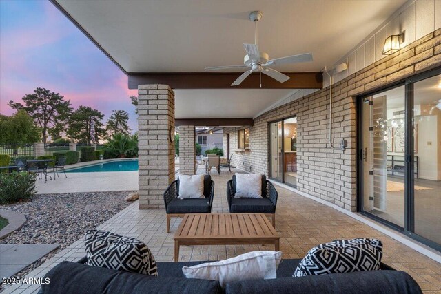 1106 N Villa Nueva Dr, Litchfield Park, AZ 85340 - view of patio / terrace with outdoor lounge area, a ceiling fan, and fence