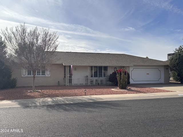 single story home with a garage