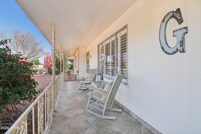 balcony featuring a porch