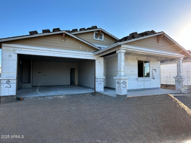 view of front of home with a garage