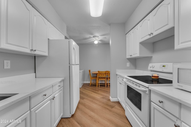 kitchen featuring white cabinetry, ceiling fan, light hardwood / wood-style floors, a textured ceiling, and white appliances