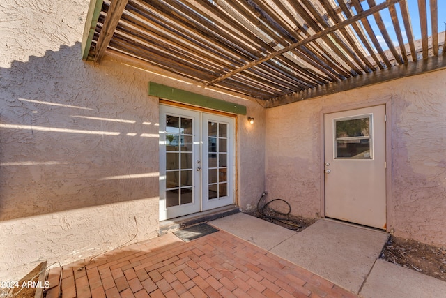 property entrance with french doors