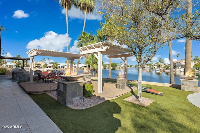 1241 W Lobster Trap Dr, Gilbert, AZ 85233 - view of patio / terrace with a pergola, a water view, and an outdoor kitchen