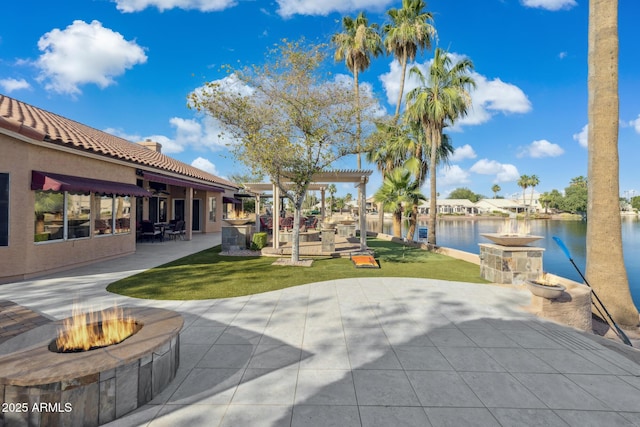 1241 W Lobster Trap Dr, Gilbert, AZ 85233 - view of patio featuring a fire pit and a water view