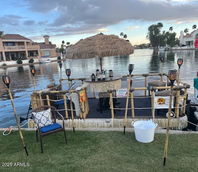 1241 W Lobster Trap Dr, Gilbert, AZ 85233 - dock area featuring a water view and a lawn