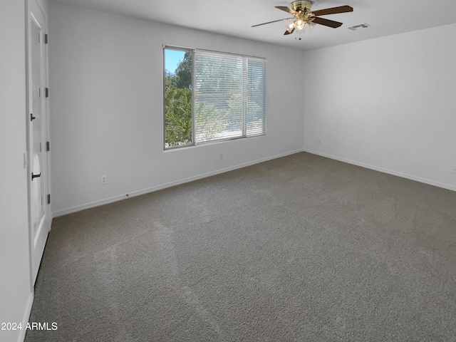 unfurnished room featuring carpet flooring and ceiling fan