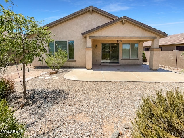 back of house featuring a patio