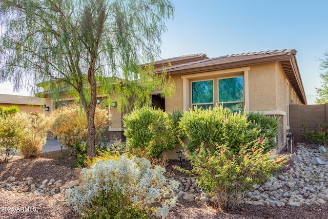 18108 W Cassia Way, Goodyear, AZ 85338 - view of front of home featuring stucco siding and a tile roof