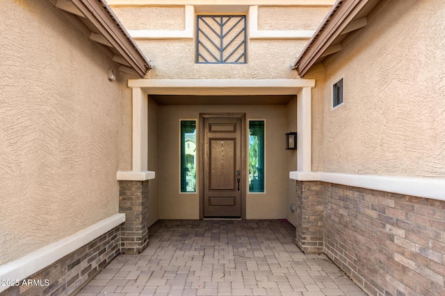 18108 W Cassia Way, Goodyear, AZ 85338 - view of exterior entry featuring stucco siding