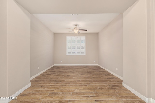 18108 W Cassia Way, Goodyear, AZ 85338 - unfurnished room featuring a ceiling fan and light wood-style flooring