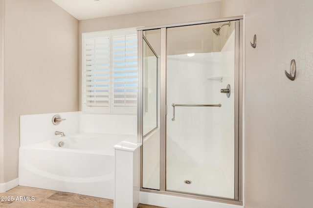 18108 W Cassia Way, Goodyear, AZ 85338 - bathroom featuring a stall shower and a garden tub