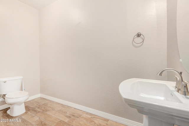 18108 W Cassia Way, Goodyear, AZ 85338 - half bathroom with a sink and toilet