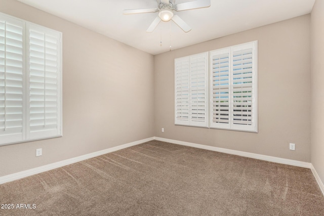 18108 W Cassia Way, Goodyear, AZ 85338 - carpeted empty room featuring baseboards and a ceiling fan